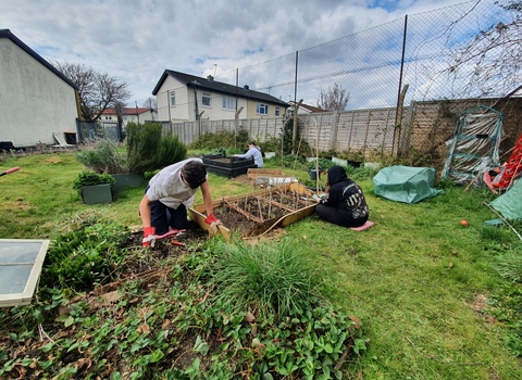 Young people working in Whaddon Community Garden
