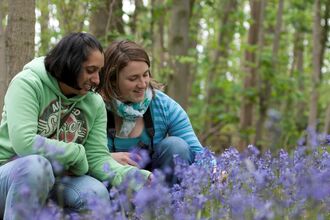 young people in a field 