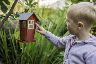 Child with bird box