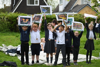 group of children with butterfly pictures