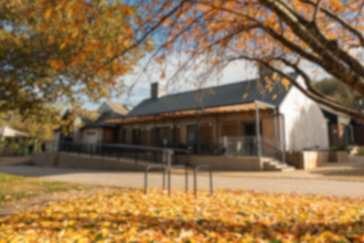 Autumn leaves and trees surrounding the building at Robinswood Hill