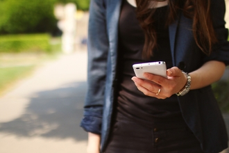 Person holding a smart phone