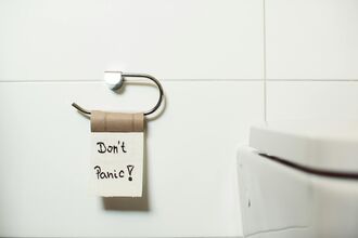 Empty Loo Roll saying Don't panic on last sheet