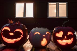 Carved Pumpkins outside a house