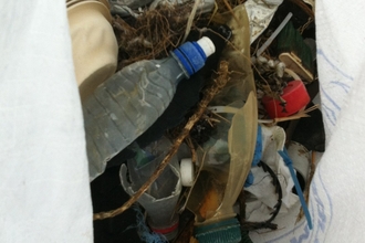 variety of plastic rubbish in a bag 