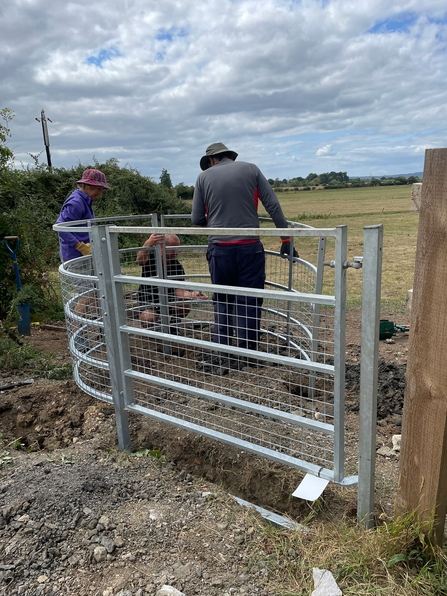 The Roaming Group installing an accessible kissing gate on the canal towpath