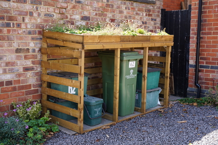 Green roofed bin store