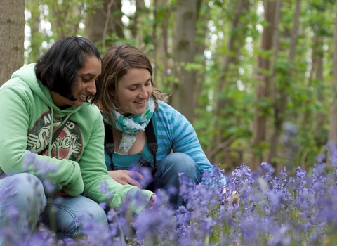 young people in a field 