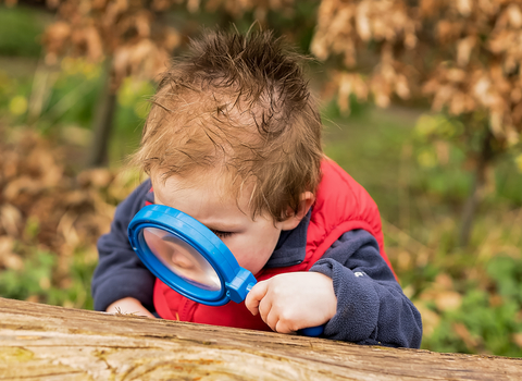 Boy magnifying glass_log_Adrian Clarke