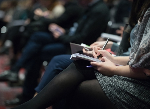 Reporter at conference