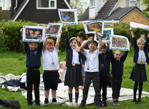 group of children with butterfly pictures